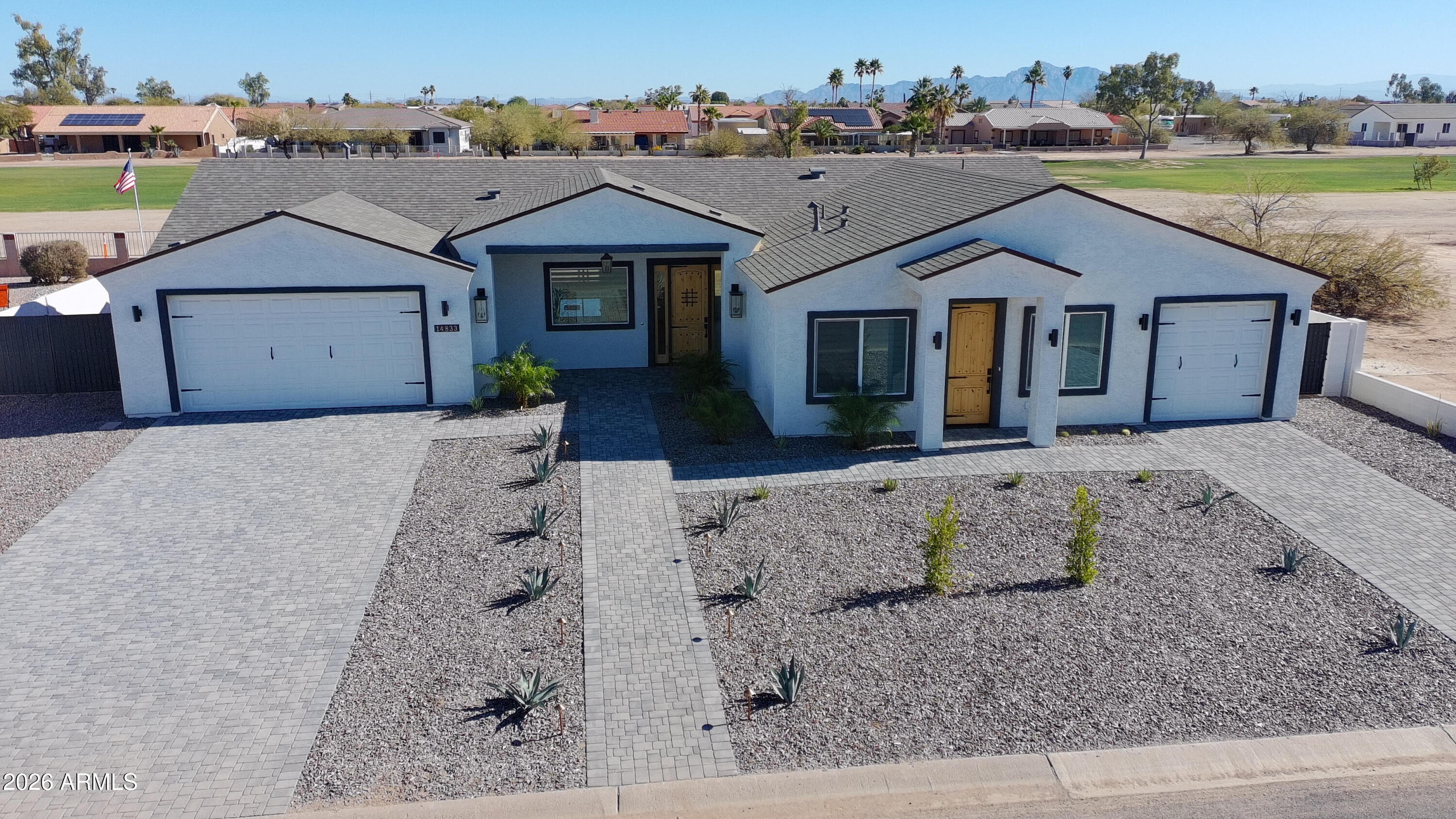 14833 South Brook Hollow Road Arizona City, AZ 85123 - Photo 60 of 61 front view of a house with a yard