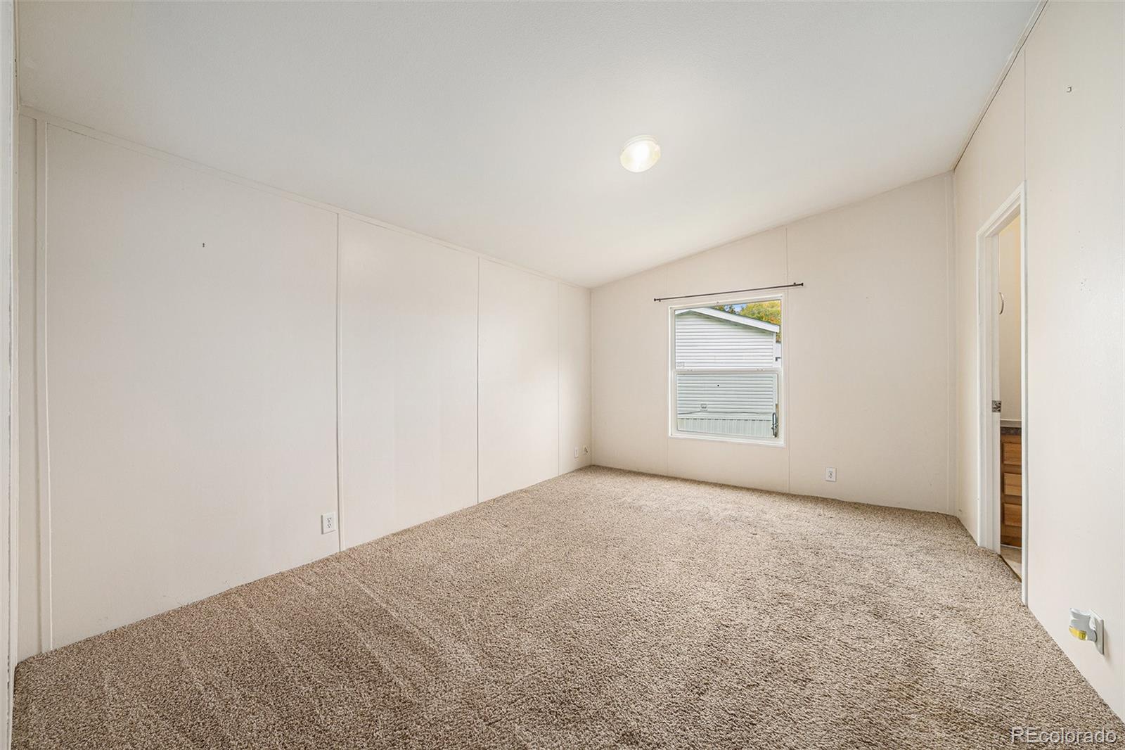 2500 East Harmony Road Fort Collins, CO 80528 - Photo 11 of 23 a view of an empty room and a window