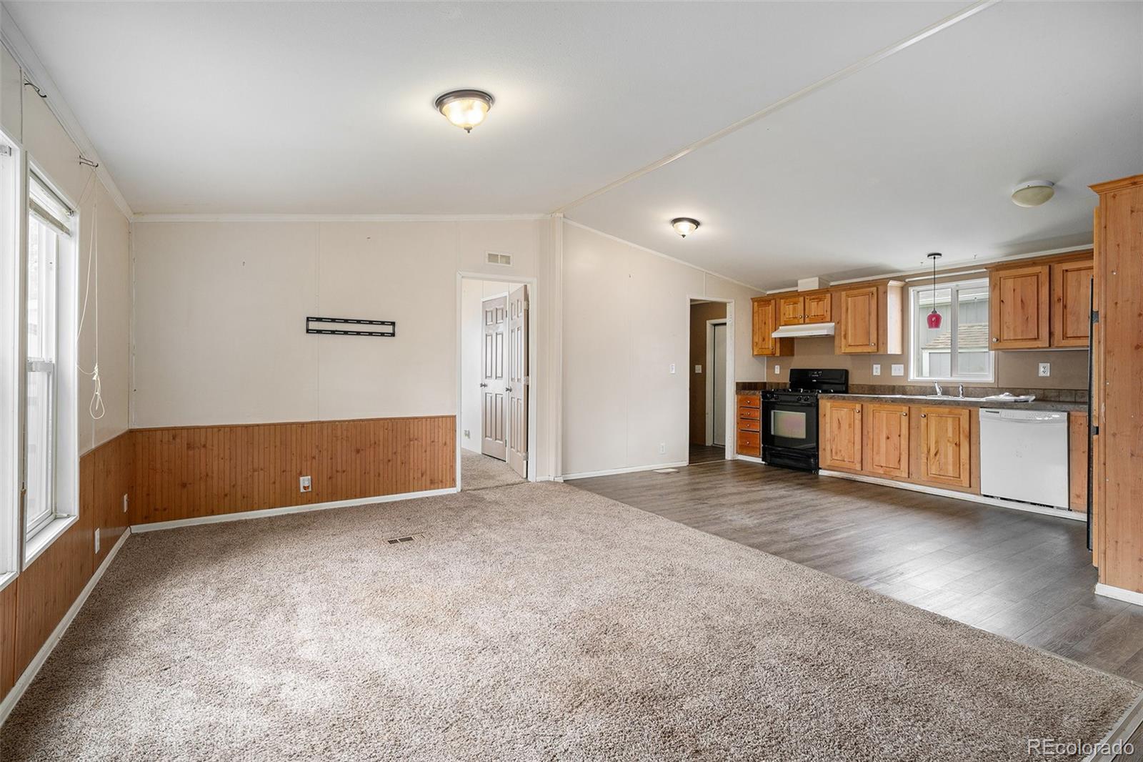 2500 East Harmony Road Fort Collins, CO 80528 - Photo 4 of 23 a view of a kitchen with a sink and cabinets