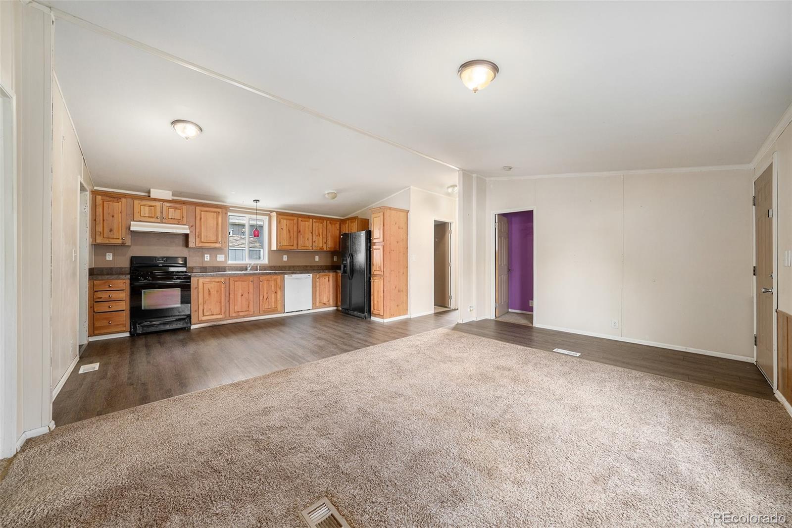 2500 East Harmony Road Fort Collins, CO 80528 - Photo 6 of 23 a view of kitchen with furniture and cabinet