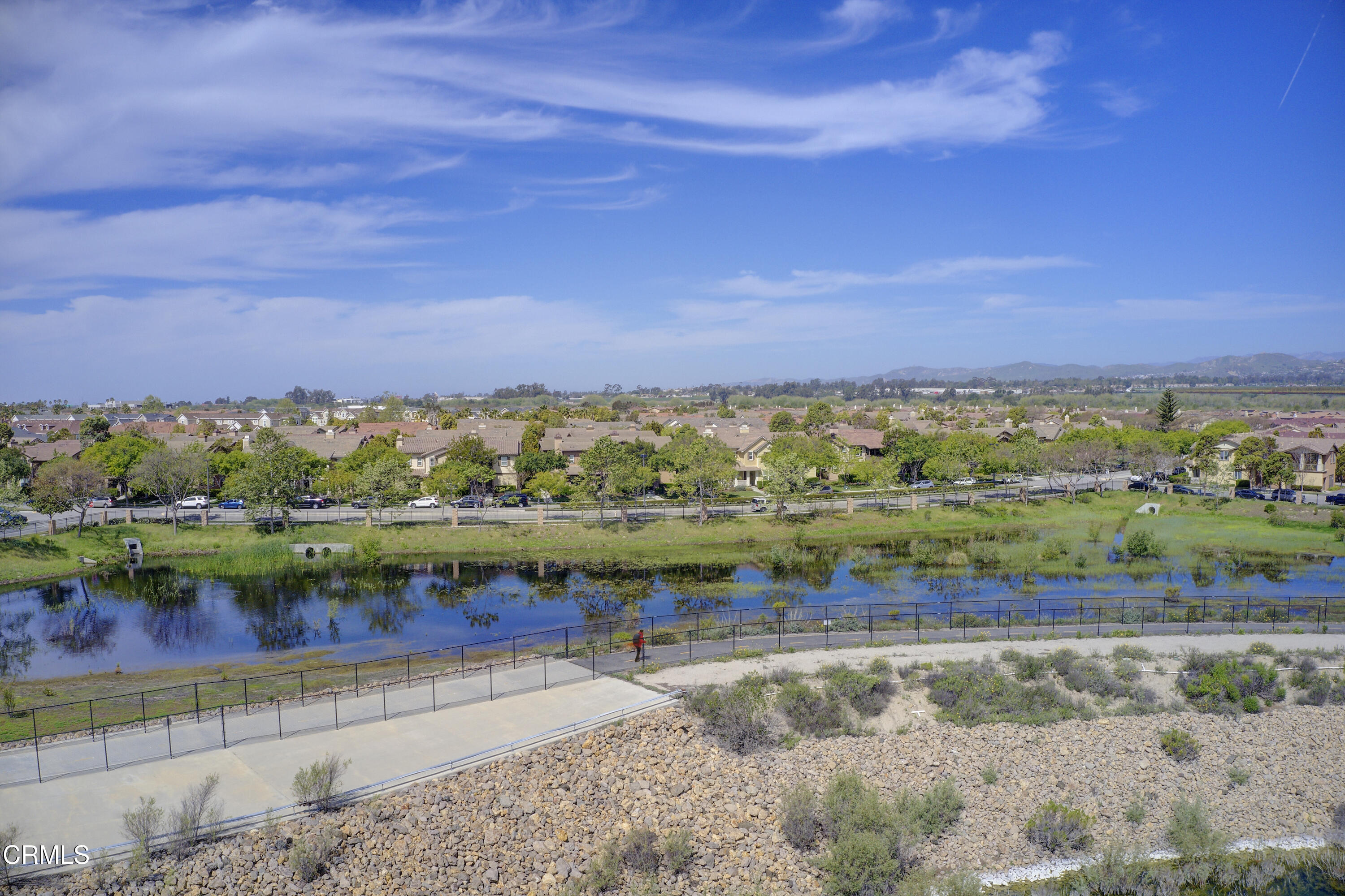 3233 Moss Landing Boulevard Oxnard, CA 93036 - Photo 53 of 57 front view of a lake with a yard