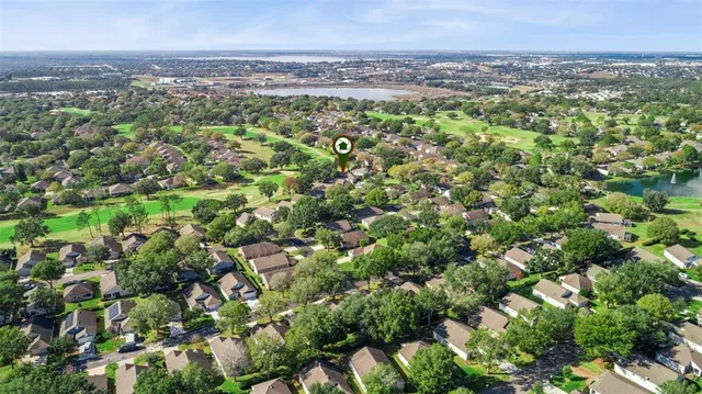 a view of a dining room with furniture and entryway