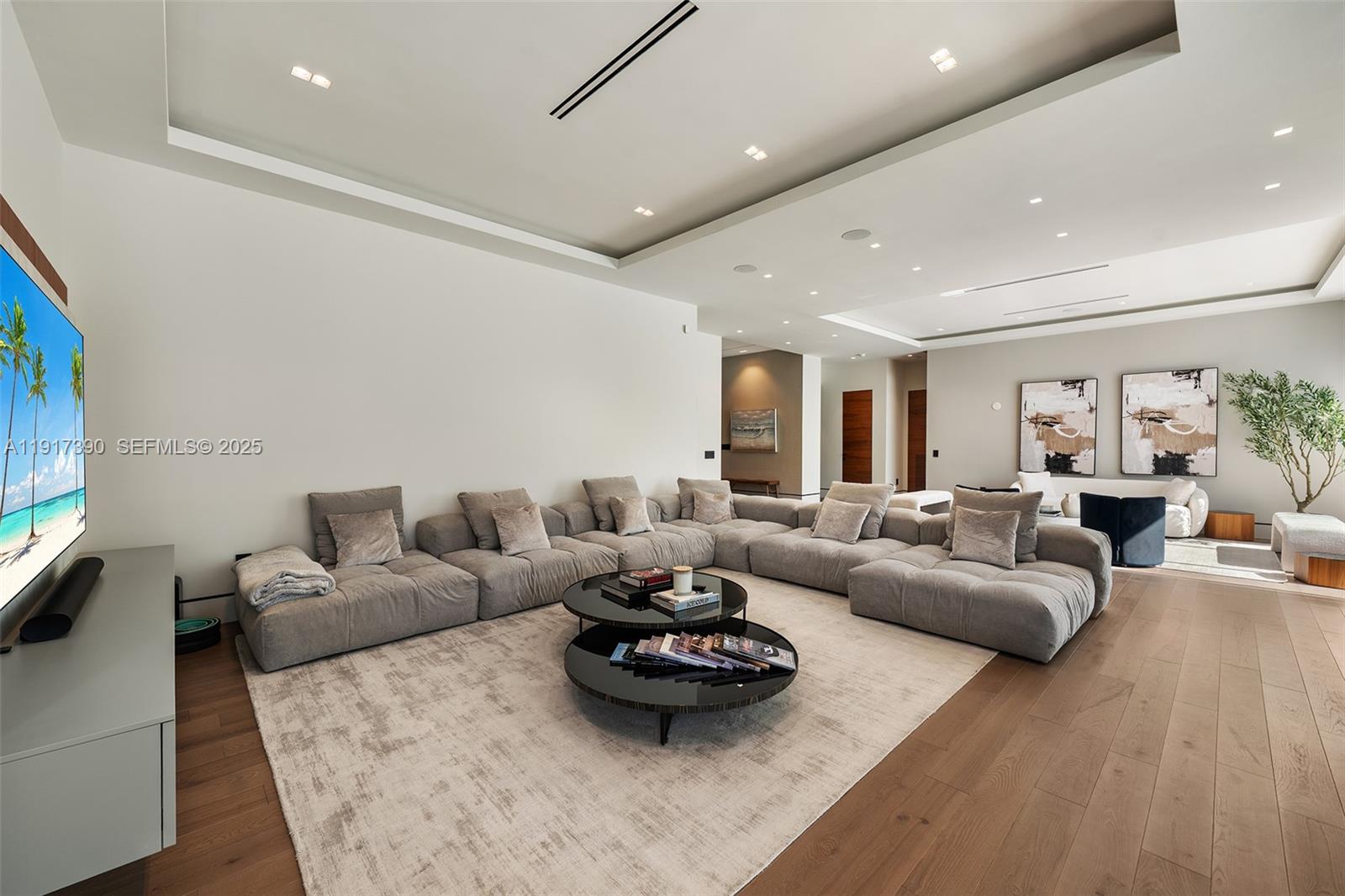 900 Washington Street Hollywood, FL 33019 - Photo 9 of 61 a living room with furniture and a wooden floor