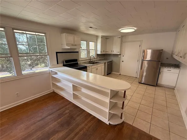 an empty room with staircase