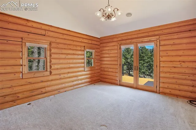 en empty room with windows