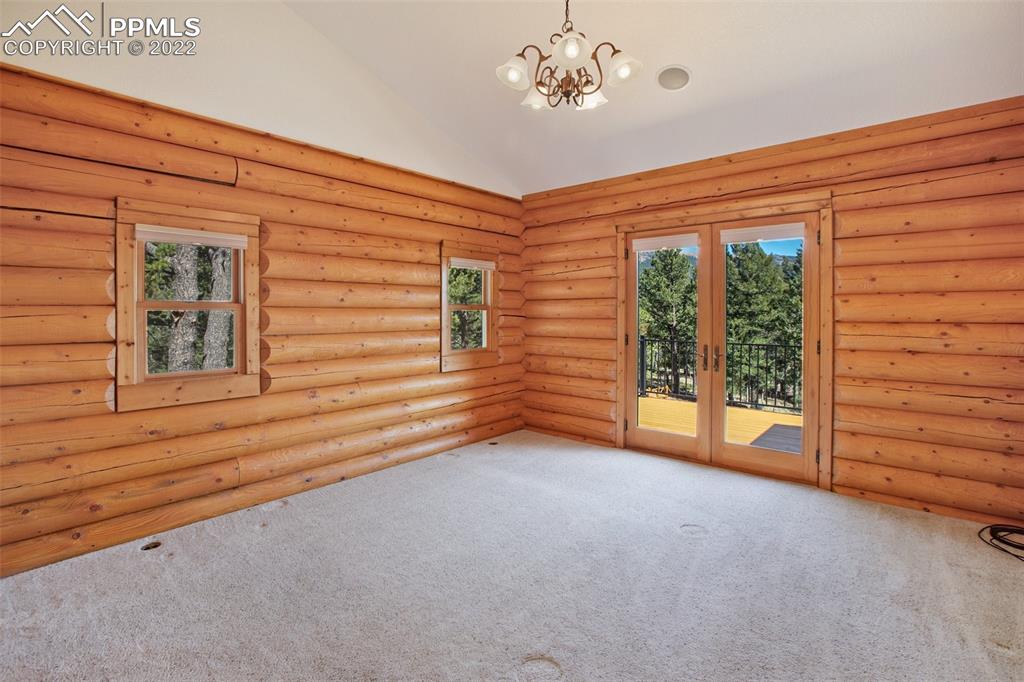 883 Rocky Mountain View Divide, CO 80814 - Photo 11 of 35 en empty room with windows