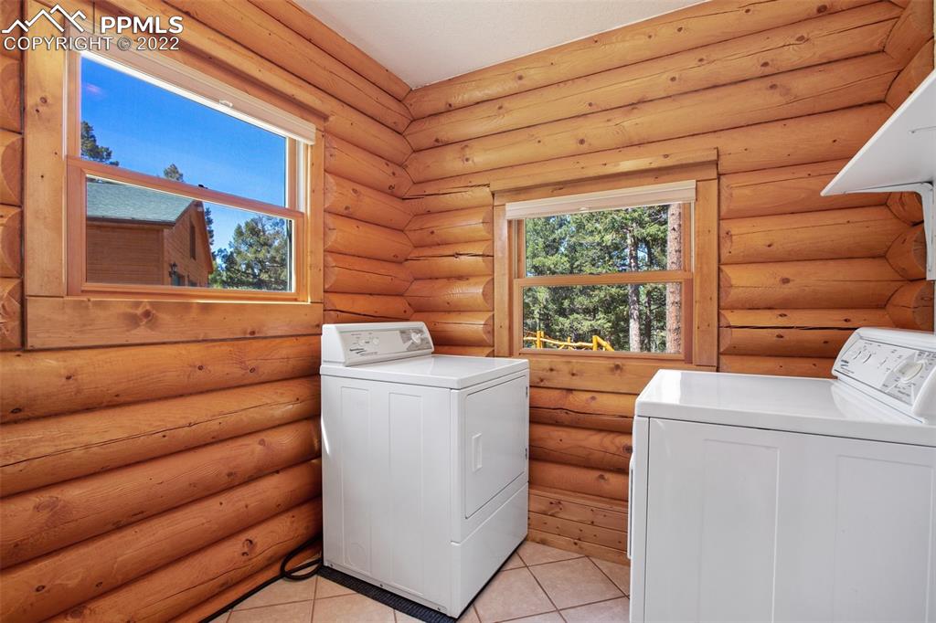 883 Rocky Mountain View Divide, CO 80814 - Photo 22 of 35 a utility room with dryer and washer