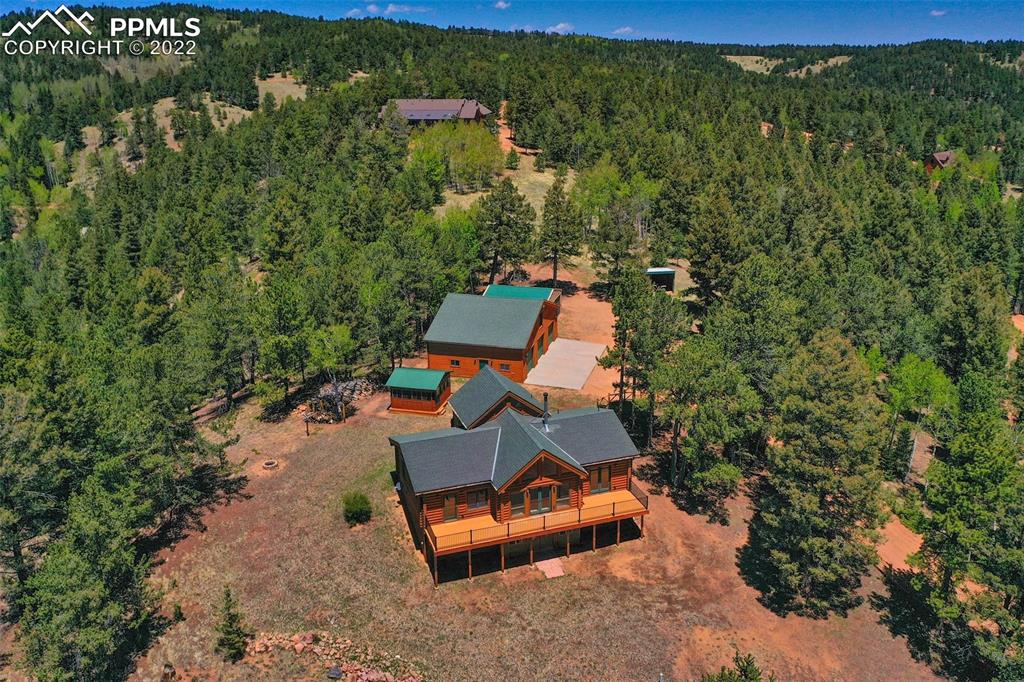 883 Rocky Mountain View Divide, CO 80814 - Photo 27 of 35 an aerial view of a house with a yard basket ball court and outdoor seating