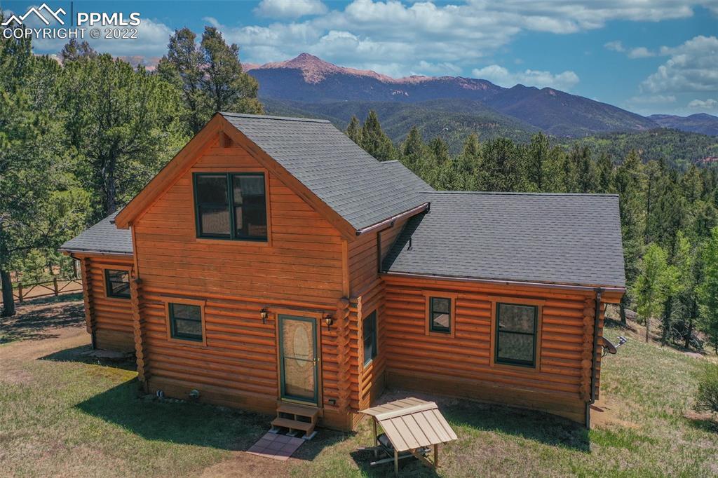 883 Rocky Mountain View Divide, CO 80814 - Photo 3 of 35 a house view with a outdoor space