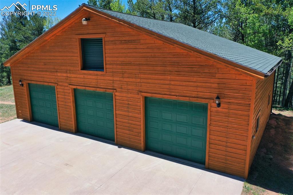 883 Rocky Mountain View Divide, CO 80814 - Photo 5 of 35 a front view of a house with a garage