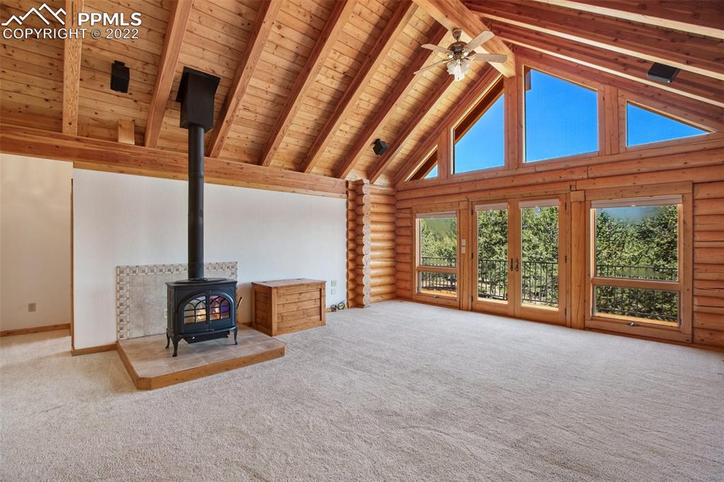 883 Rocky Mountain View Divide, CO 80814 - Photo 6 of 35 a view of an empty room with furniture and windows
