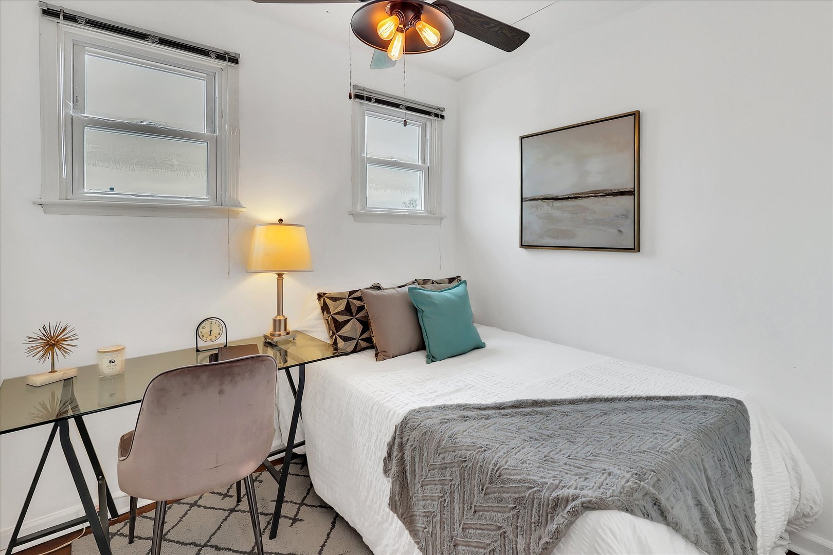 4038 Grove Avenue Brookfield, IL 60513 - Photo 27 of 45 a bedroom with a bed and painting on the wall