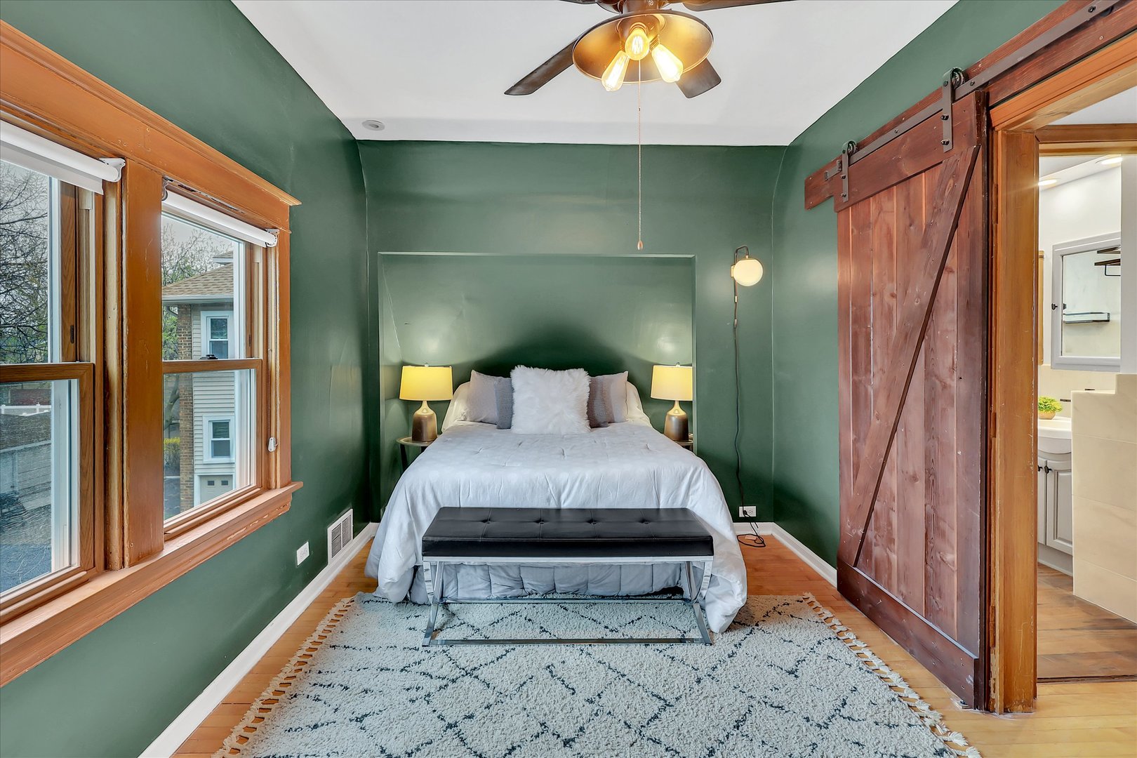 4038 Grove Avenue Brookfield, IL 60513 - Photo 31 of 45 a bedroom with a bed and a mirror