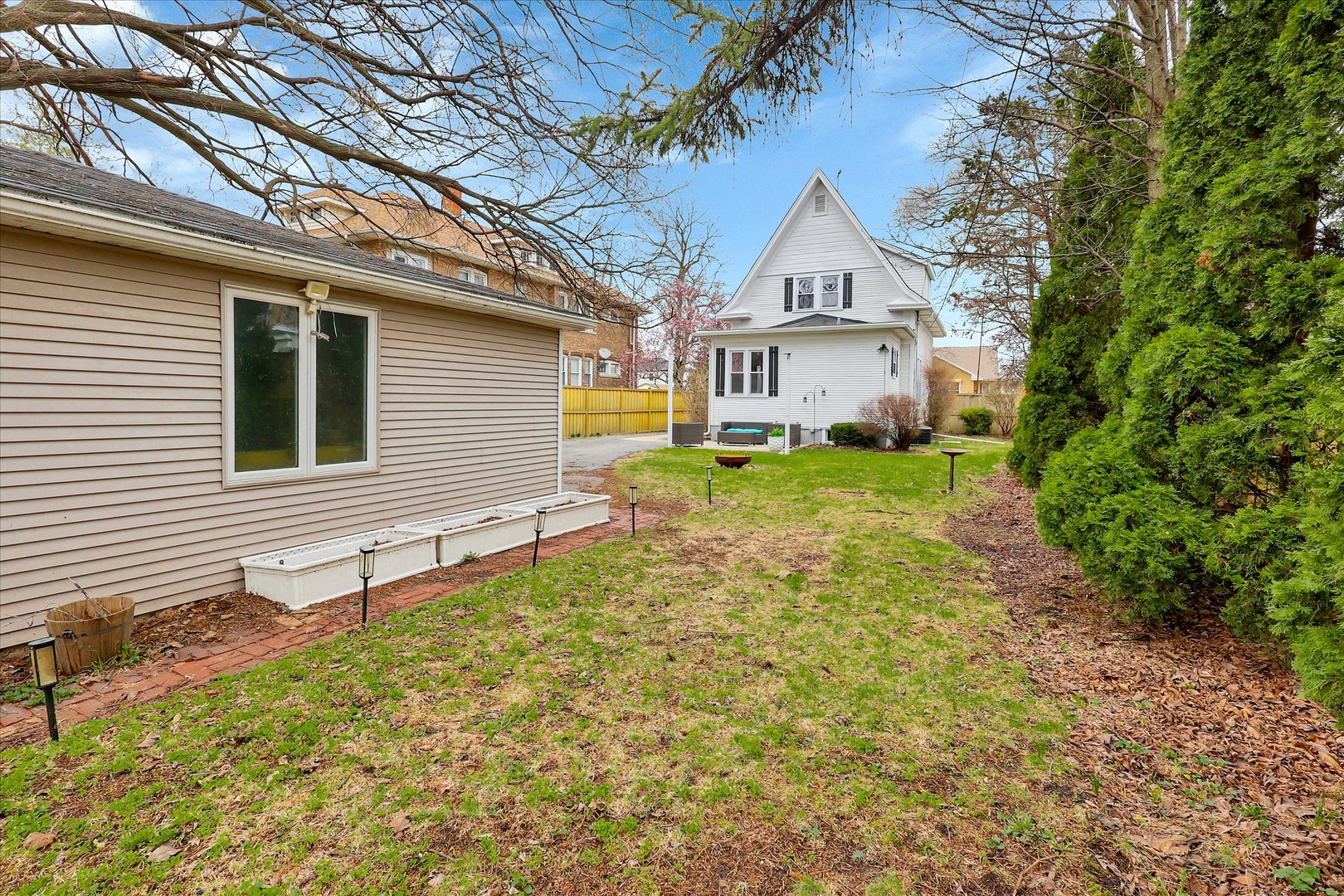 4038 Grove Avenue Brookfield, IL 60513 - Photo 40 of 45 a view of a house with a yard