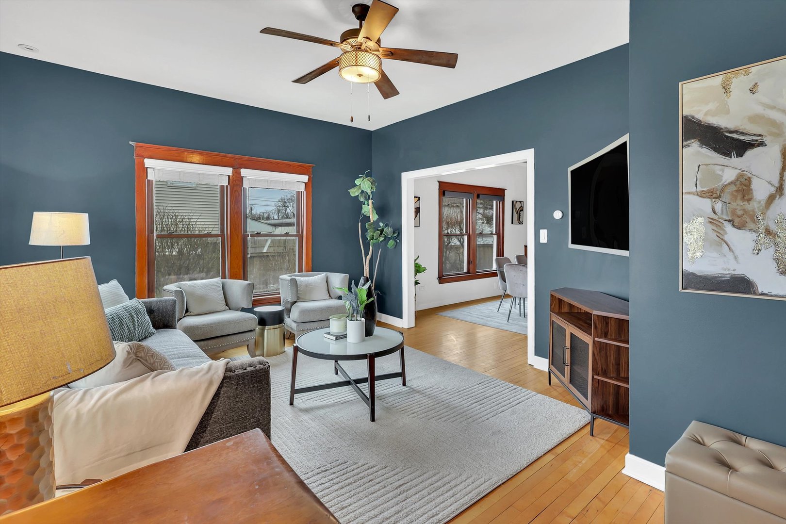 4038 Grove Avenue Brookfield, IL 60513 - Photo 5 of 45 a living room with furniture and a flat screen tv