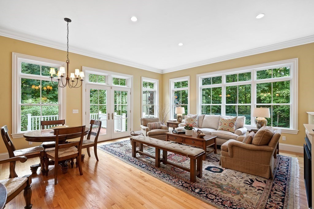135 Washington Street Wellesley, MA 02481 - Photo 13 of 39 a living room with furniture and a large window