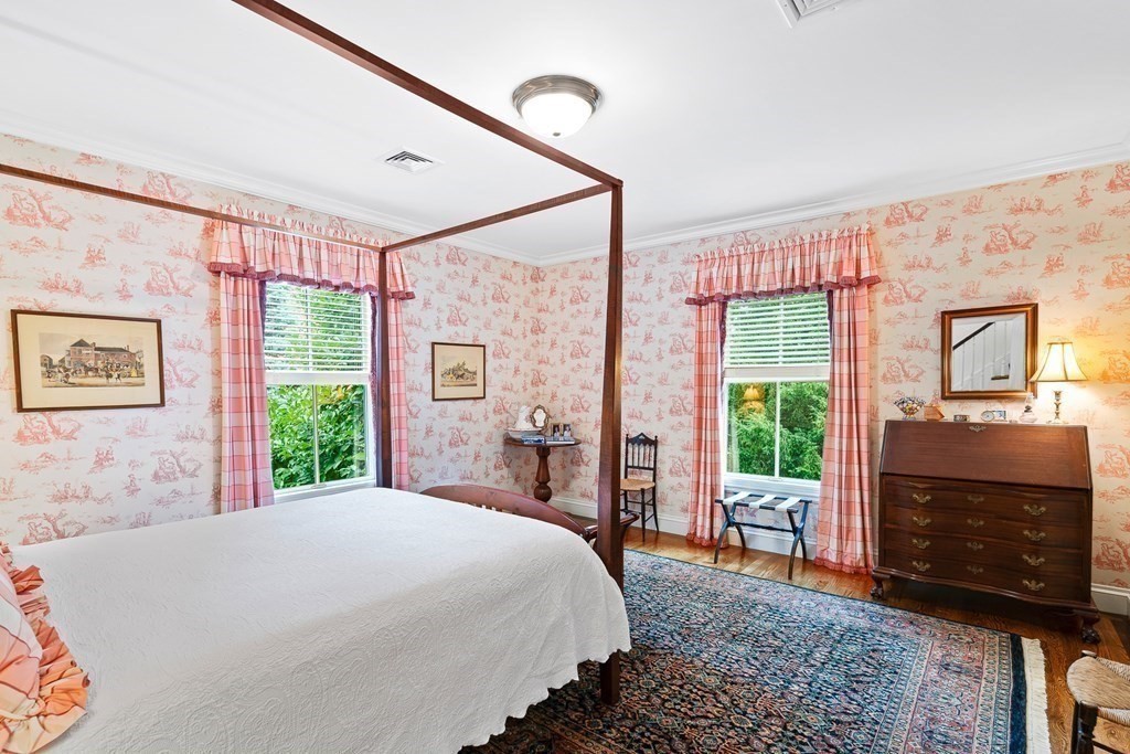 135 Washington Street Wellesley, MA 02481 - Photo 21 of 39 a bedroom with a large bed and a window