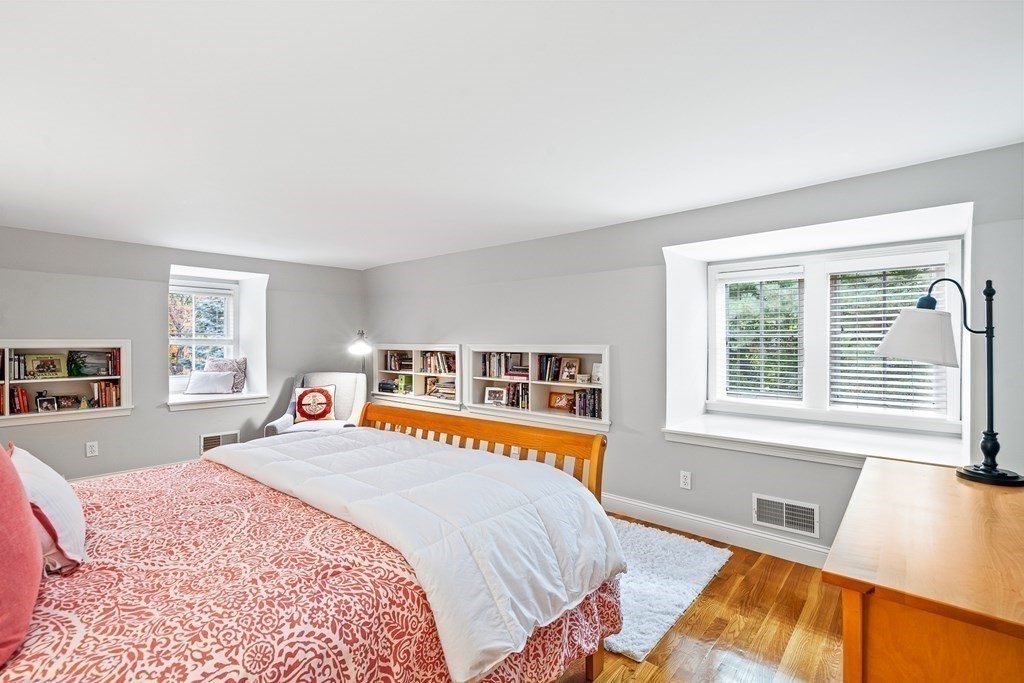 135 Washington Street Wellesley, MA 02481 - Photo 26 of 39 a bedroom with a bed and a large window