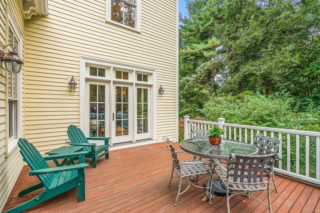 135 Washington Street Wellesley, MA 02481 - Photo 29 of 39 a view of a chair and table in the balcony
