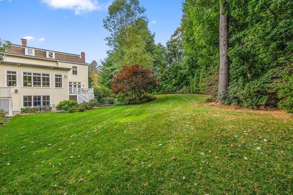 135 Washington Street Wellesley, MA 02481 - Photo 34 of 39 a view of a big yard with large trees
