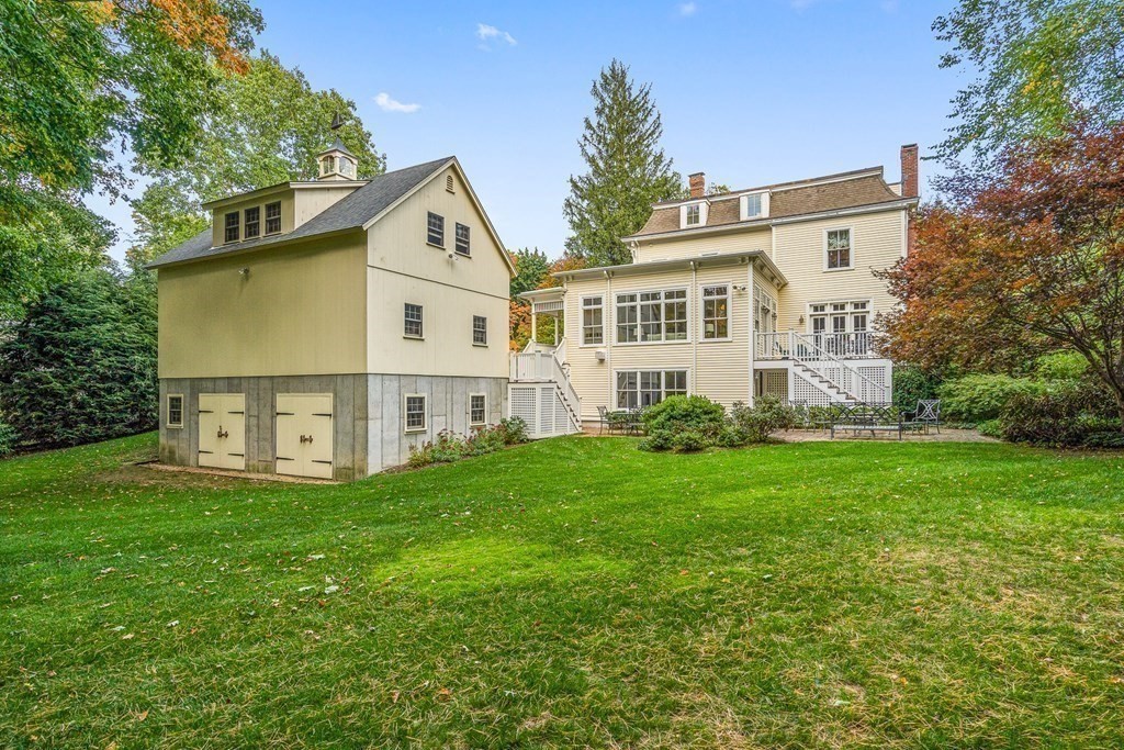135 Washington Street Wellesley, MA 02481 - Photo 35 of 39 a view of a house with a big yard and large trees