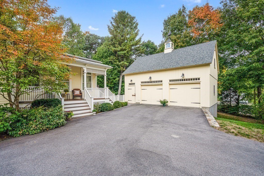 135 Washington Street Wellesley, MA 02481 - Photo 39 of 39 a view of a house with a yard and garage
