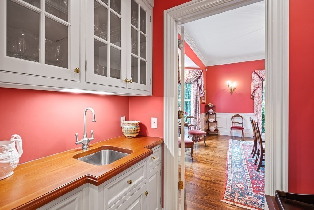 135 Washington Street Wellesley, MA 02481 - Photo 8 of 39 a view of a kitchen with a sink and cabinets