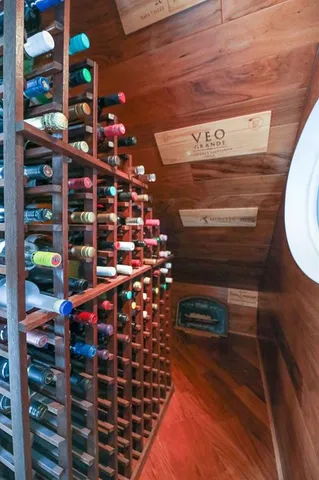 a bedroom with a bed and a ceiling fan