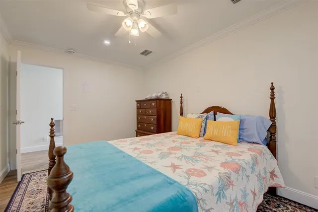 a bathroom with a double vanity sink toilet mirror and bathtub