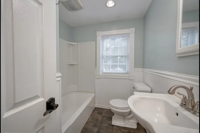 a bathroom with a sink and a bathtub