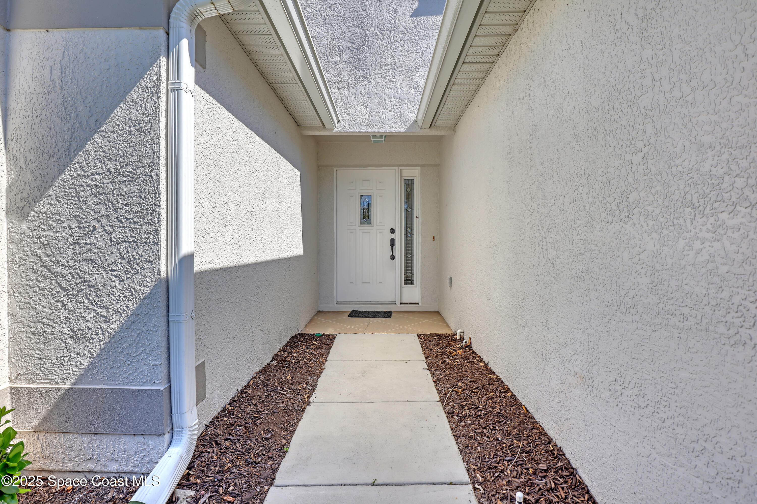 1692 Keys Gate Drive Melbourne, FL 32940 - Photo 2 of 26 a view of an entryway
