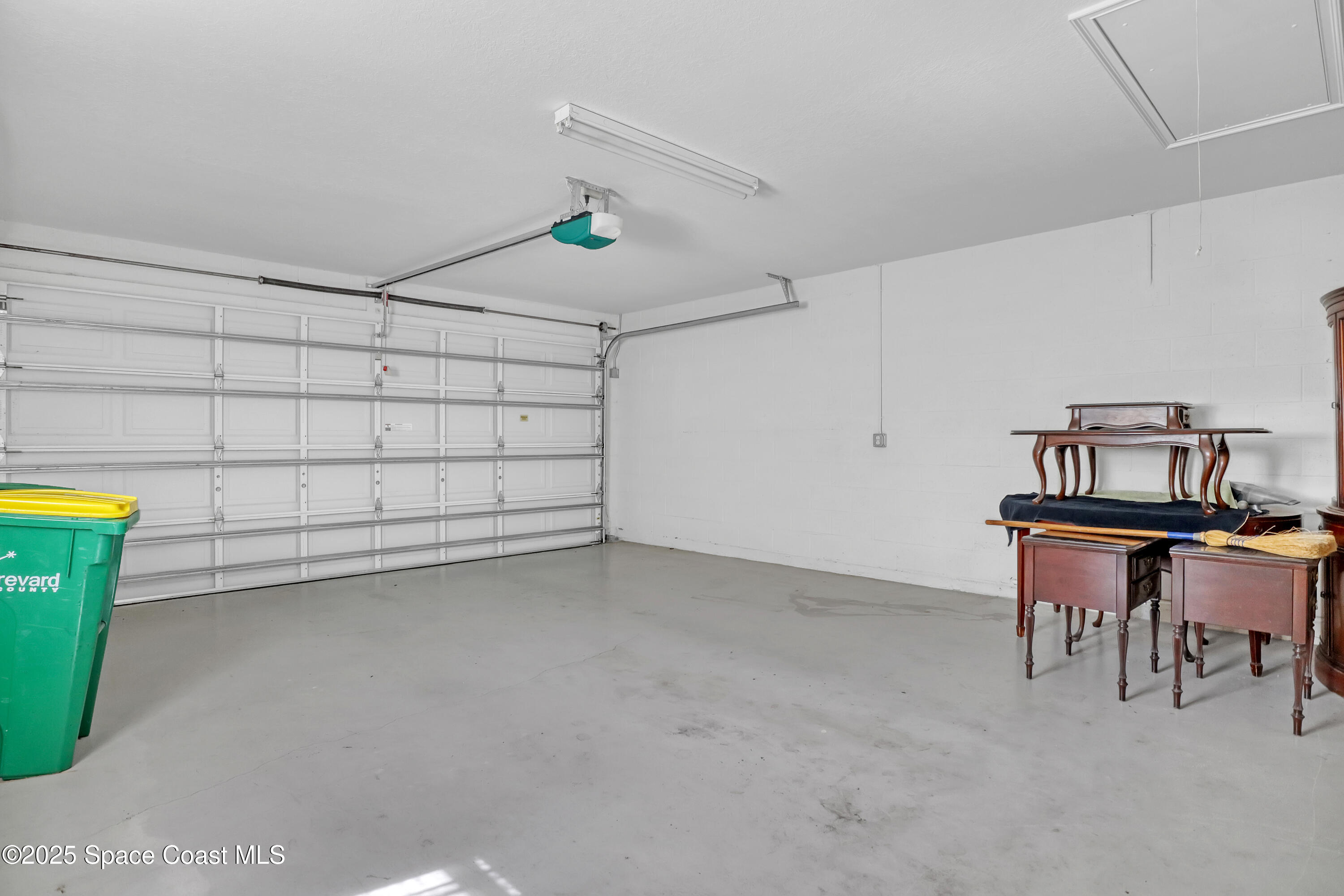 1692 Keys Gate Drive Melbourne, FL 32940 - Photo 26 of 26 a view of a room with racks on the wall
