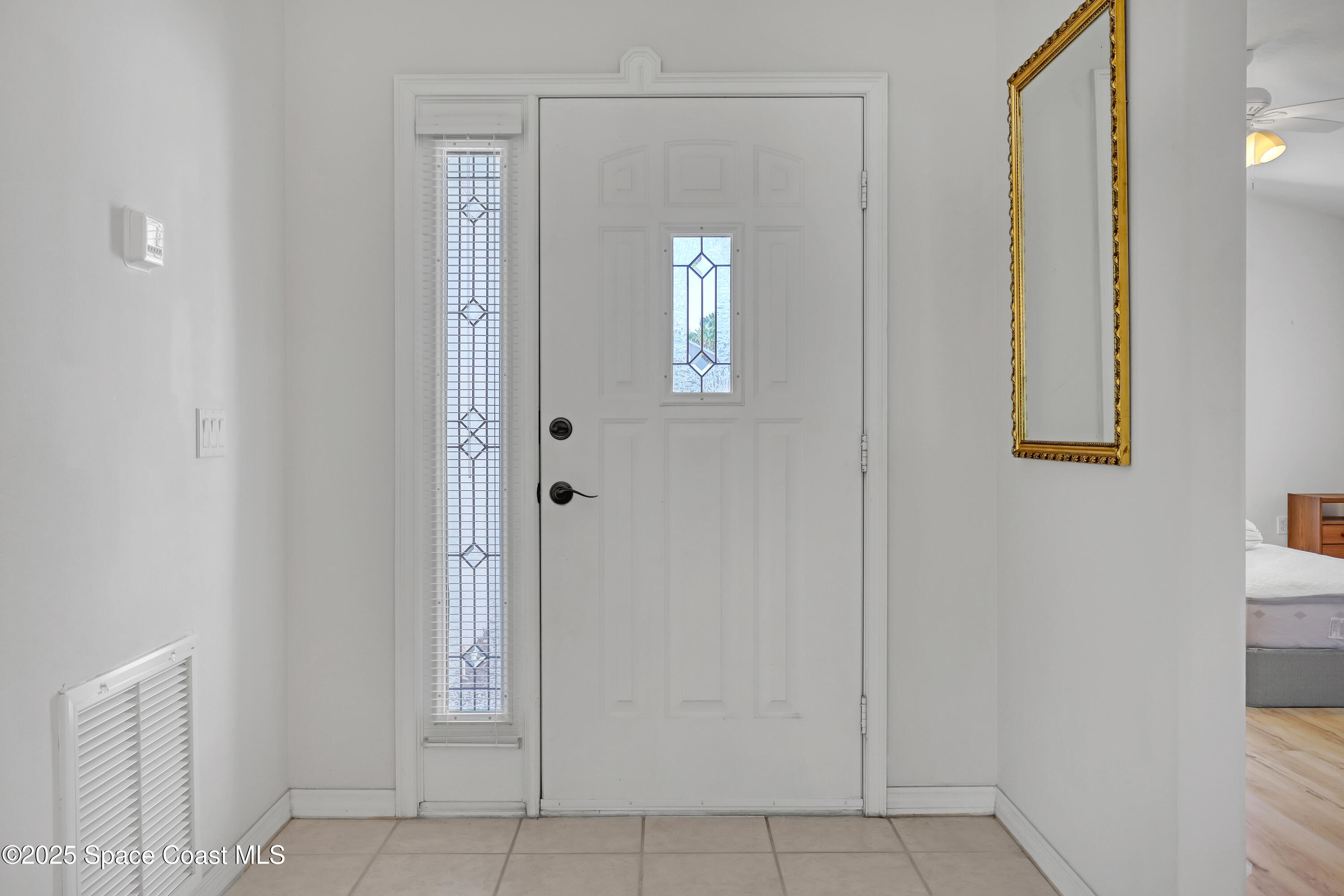 1692 Keys Gate Drive Melbourne, FL 32940 - Photo 3 of 26 wooden floor in a gallery