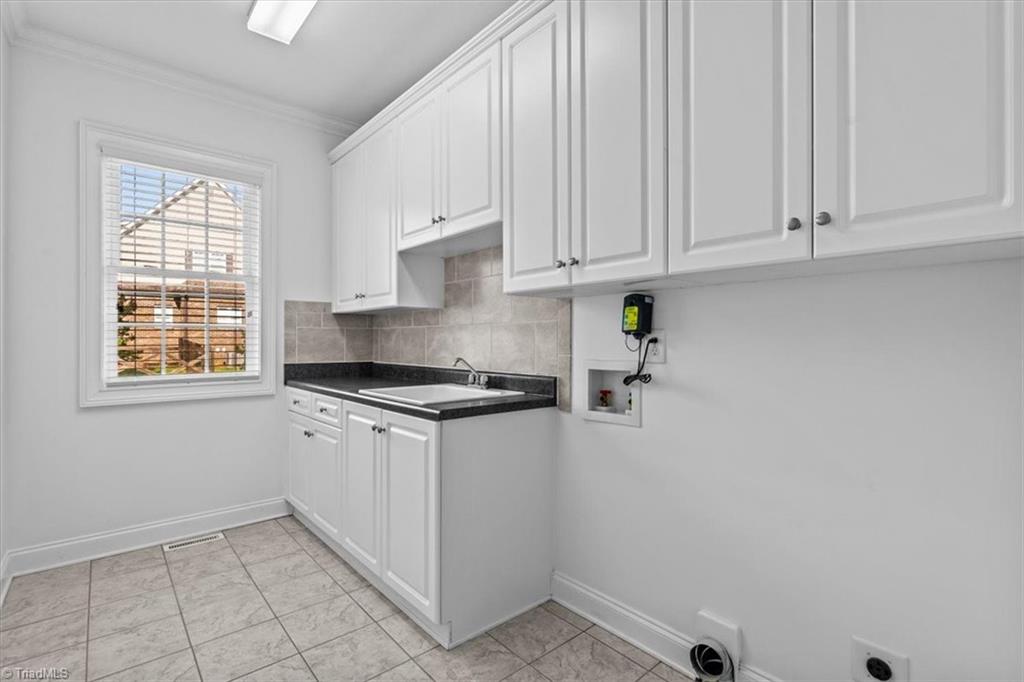 7103 Ludgate Road Gibsonville, NC 27249 - Photo 23 of 49 Utility Room