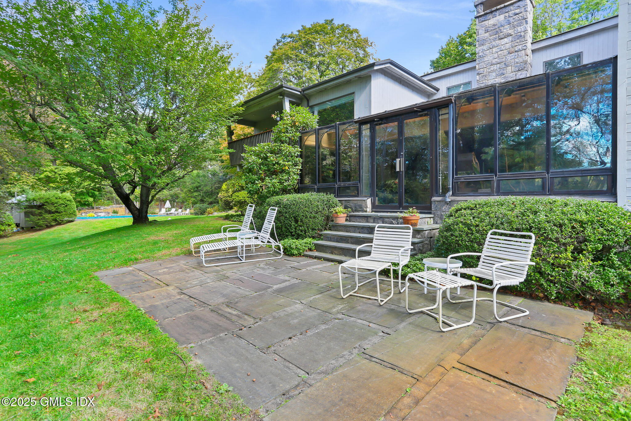 43 Sterling Road South Greenwich, CT 06831 - Photo 33 of 45 a view of backyard with outdoor seating and green space