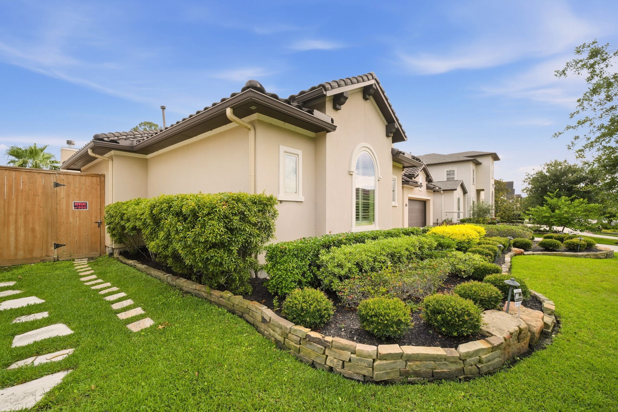 5815 Stratton Woods Drive Spring, TX 77389 - Photo 4 of 45 a view of a white house with a small yard and potted plants