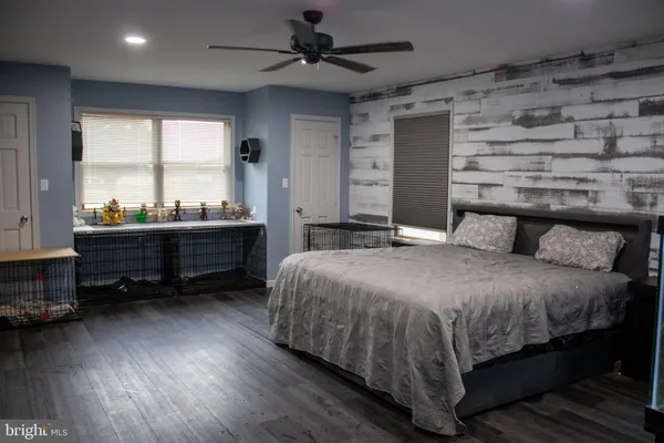 a kitchen with stainless steel appliances granite countertop a sink a microwave and cabinets