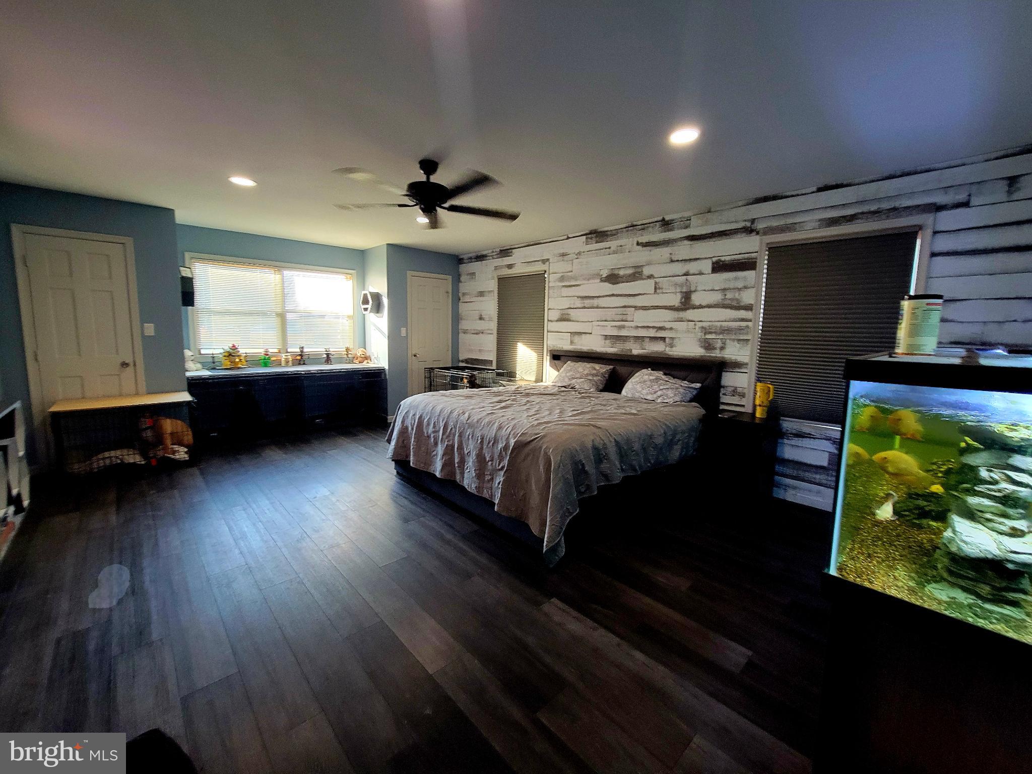 49993 Airedele Road Ridge, MD 20680 - Photo 16 of 34 Primary retreat with rustic charm. 3 closets!