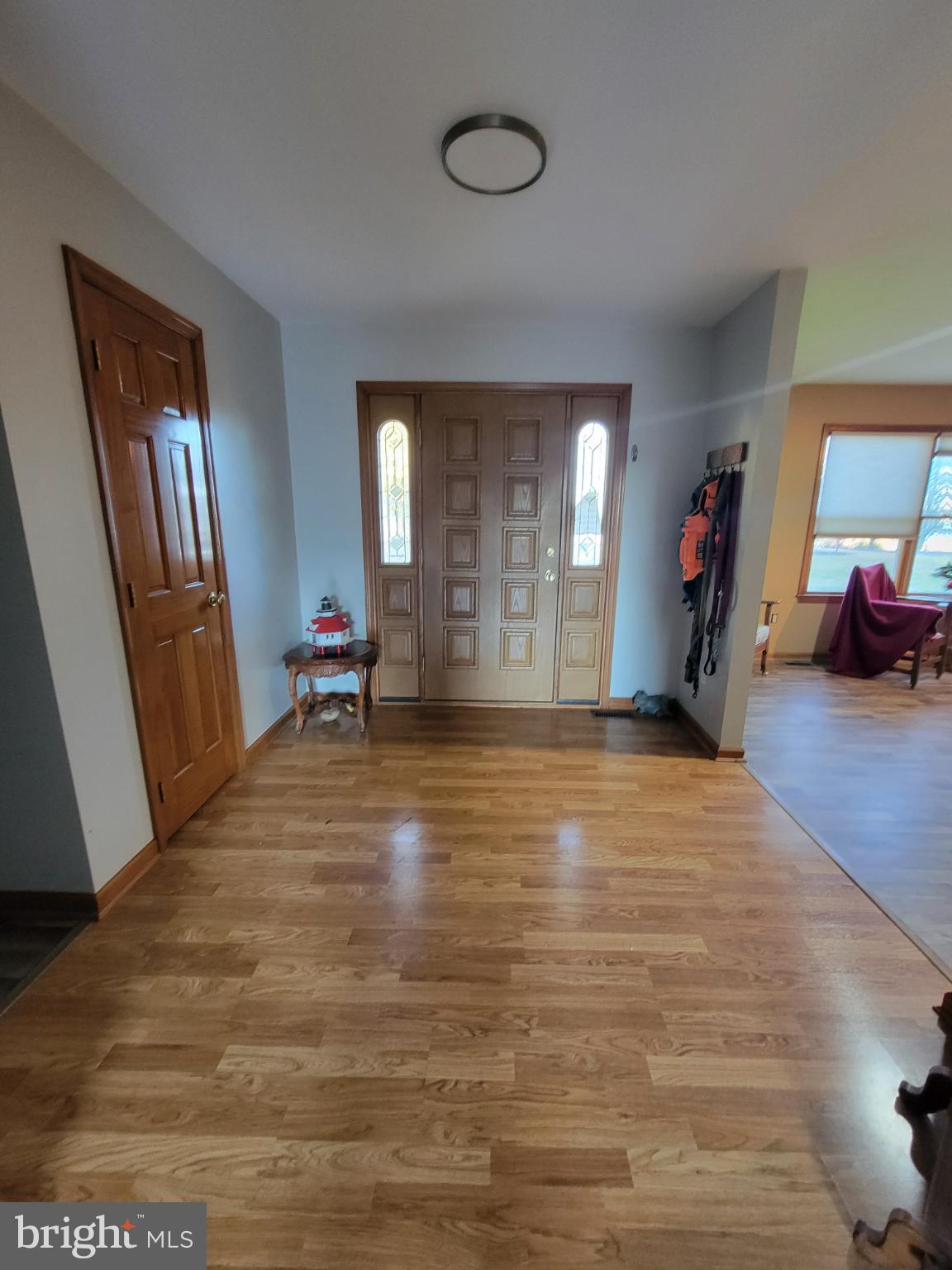 49993 Airedele Road Ridge, MD 20680 - Photo 18 of 34 Welcoming entryway with warm wooden tones.