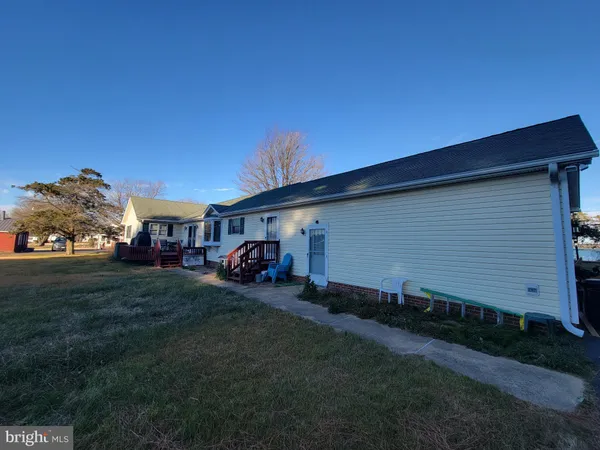a view of a yard with an outdoor space