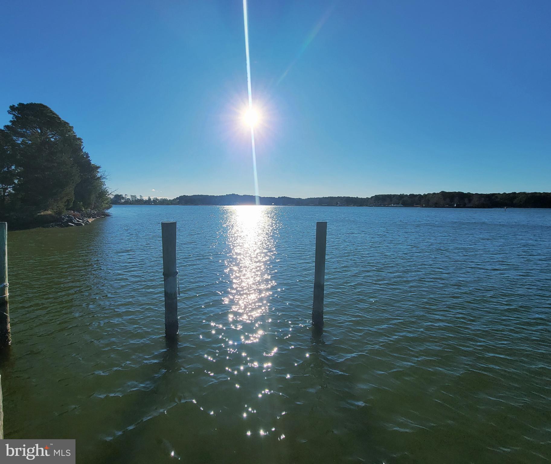 49993 Airedele Road Ridge, MD 20680 - Photo 28 of 34 Sunlit serenity over tranquil waters.