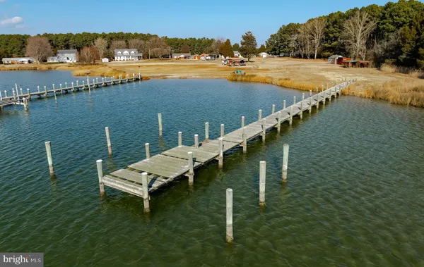 a bed room with furniture and a fireplace