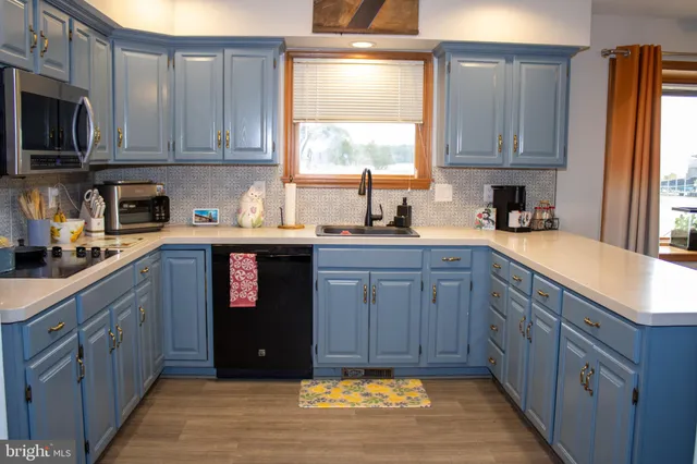 a view of livingroom with furniture and floor to ceiling window