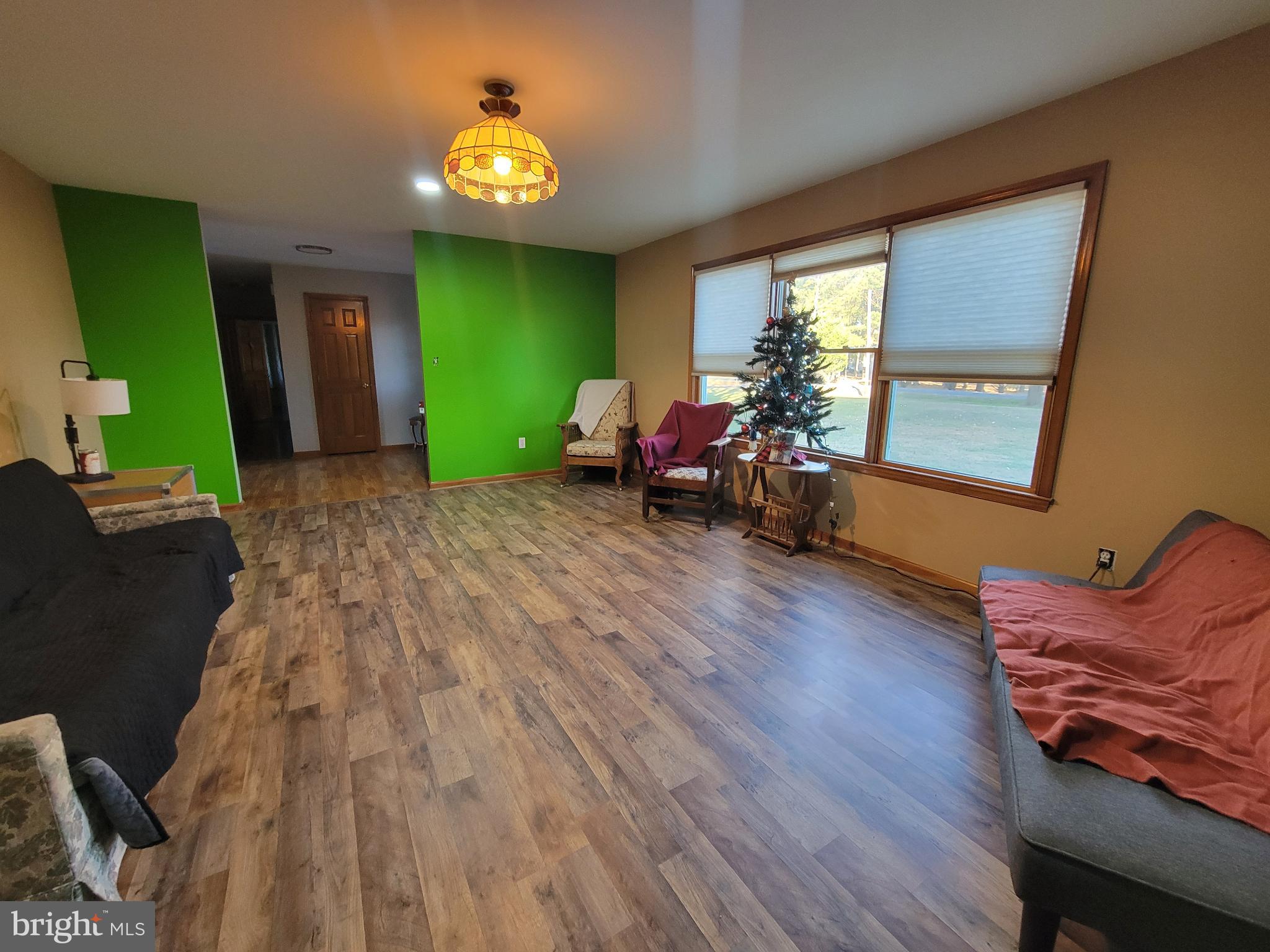 49993 Airedele Road Ridge, MD 20680 - Photo 6 of 34 This living room will hold a huge sectional!