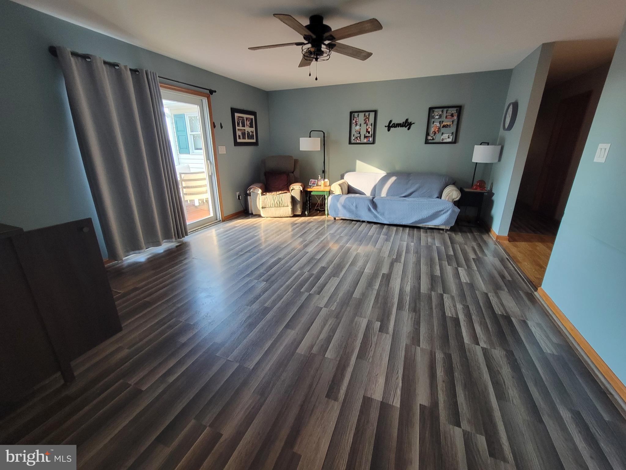 49993 Airedele Road Ridge, MD 20680 - Photo 8 of 34 Family room leads to deck and has water view