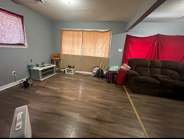 a room with a couch and a window