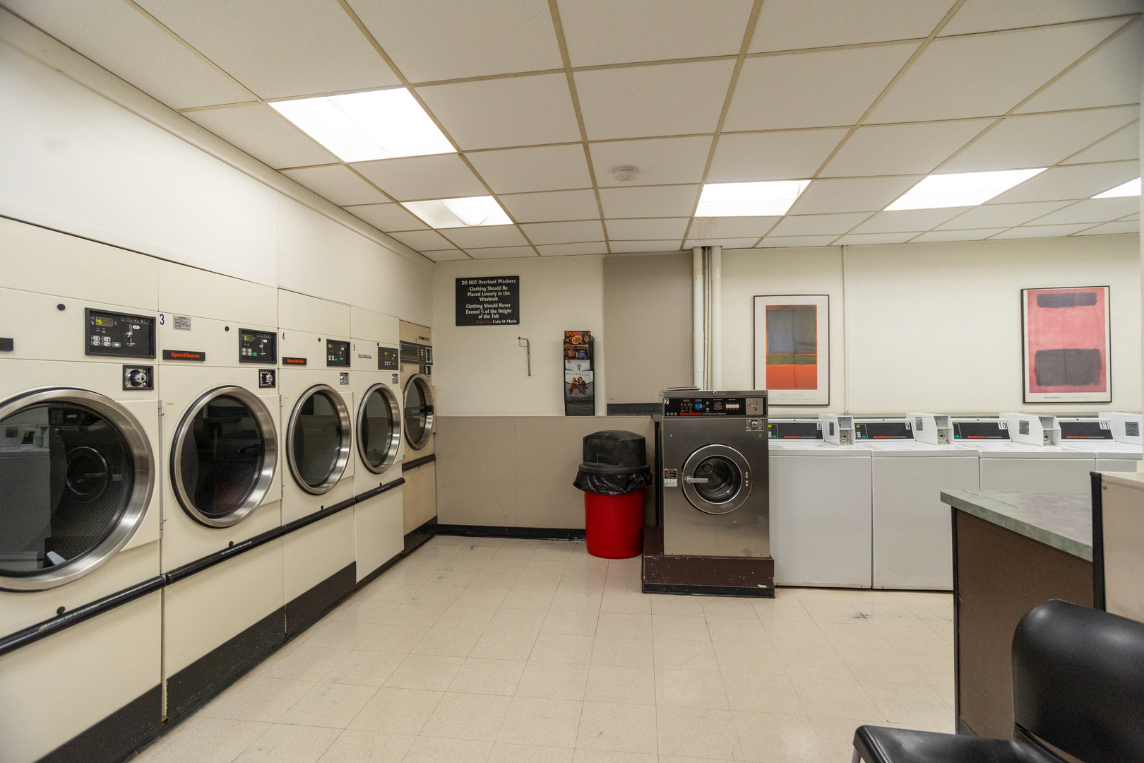 5701 North Sheridan Road, Unit 9N Chicago, IL 60660 - Photo 14 of 17 a utility room with sink dryer and washer