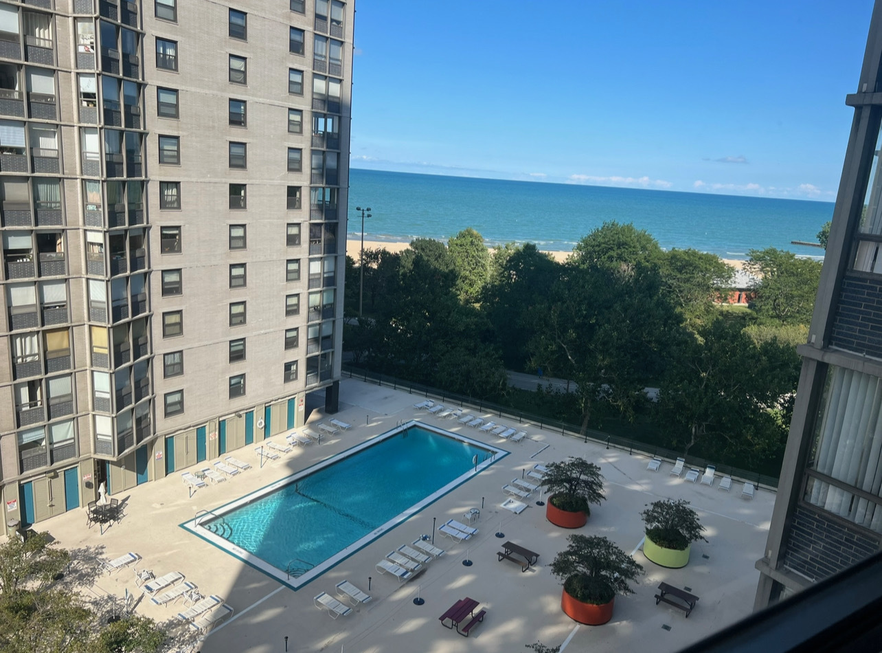 5701 North Sheridan Road, Unit 9N Chicago, IL 60660 - Photo 2 of 17 a view of a balcony with chair and table