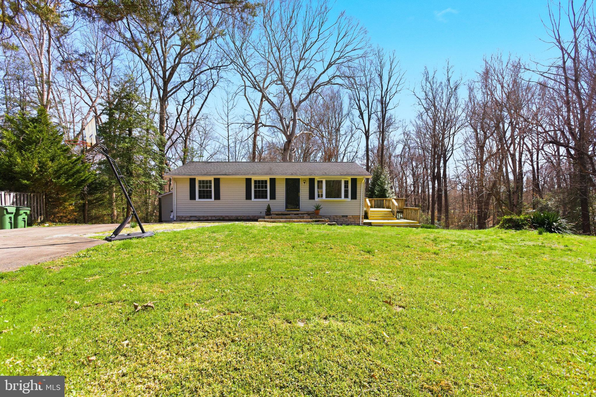 7012 Stanley Road King George, VA 22485 - Photo 2 of 37 Charming home nestled in nature's embrace.