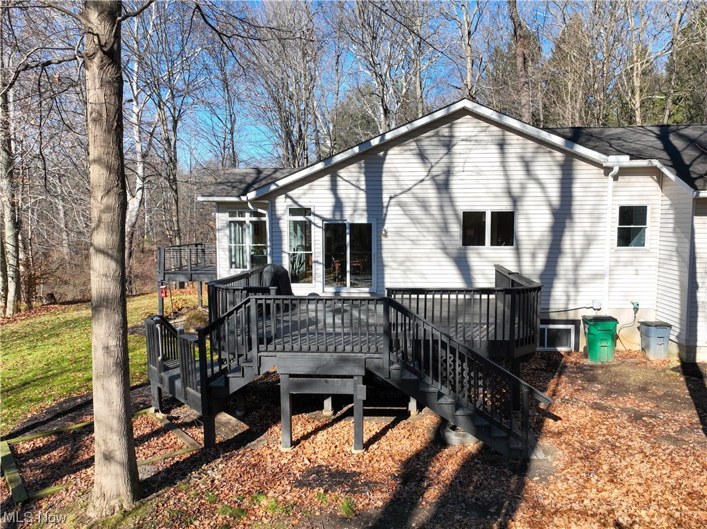 13730 Sperry Road Novelty, OH 44072 - Photo 25 of 31 Rear view of property with a deck